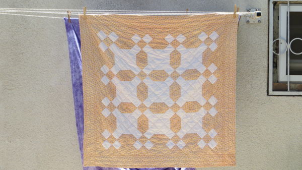 nine-patch and snowball blocks quilt
